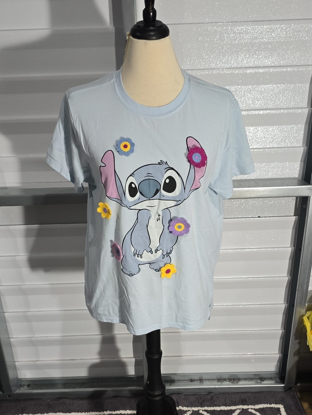 Disney Light Blue Stitchโ Tee with Pink & Yellow Flower Accents Size XL